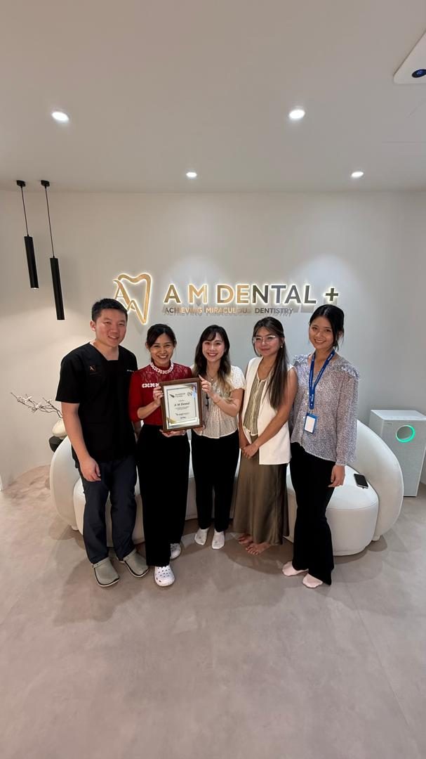 The A M Dental team with their Angel Aligner Platinum Provider award