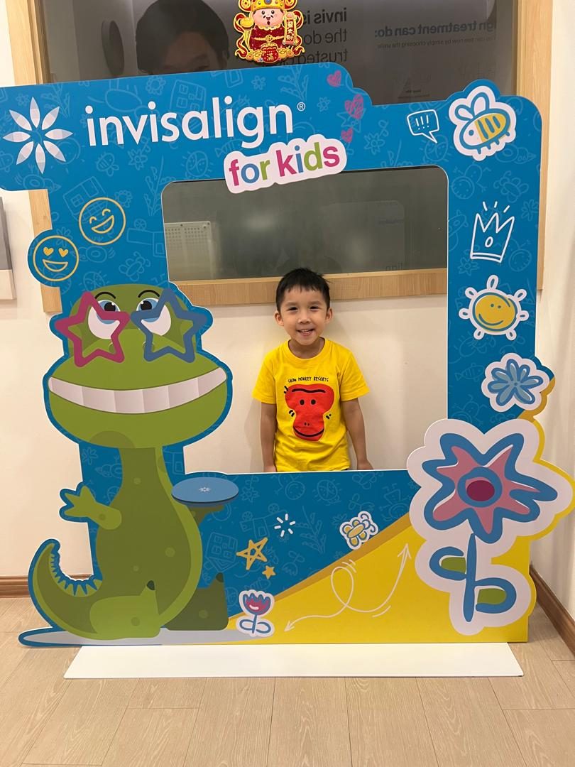 A child enjoying a visit to A M Dental