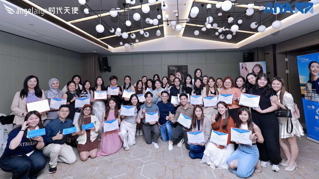 Course graduates with their certificates
