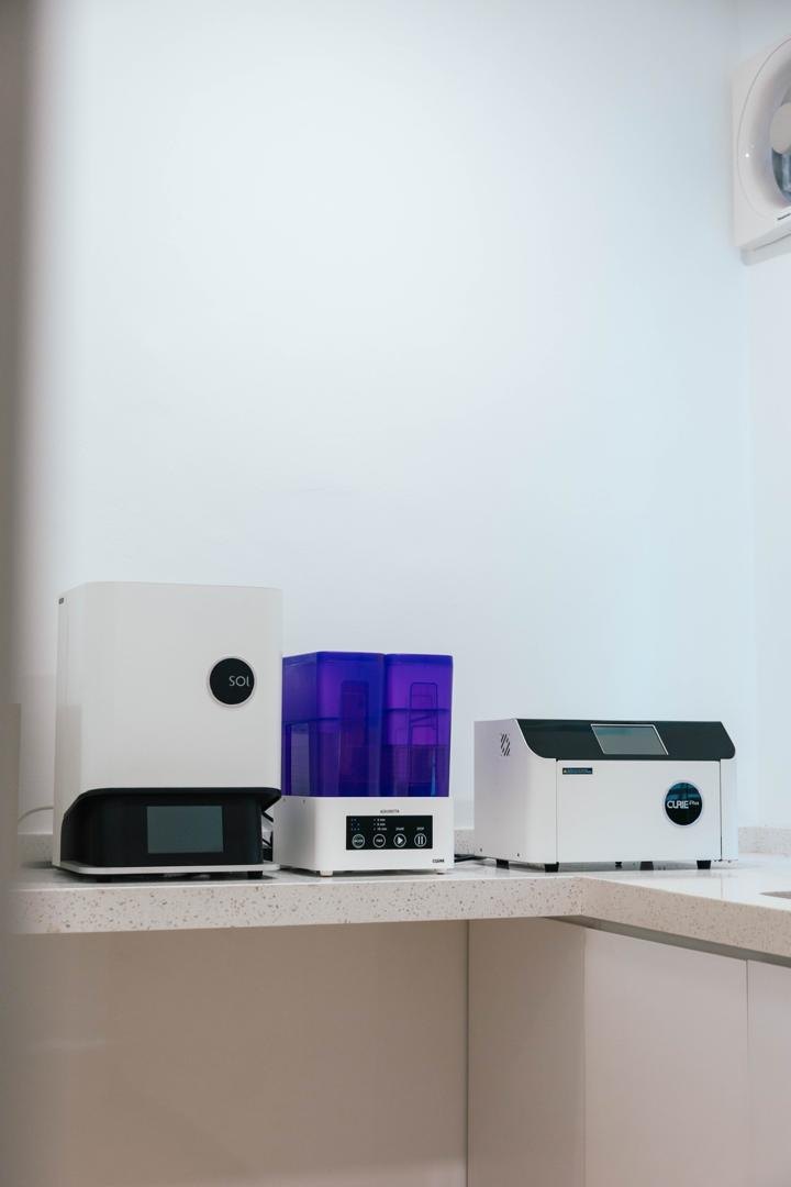 In-house digital 3D printing equipment at A M Dental